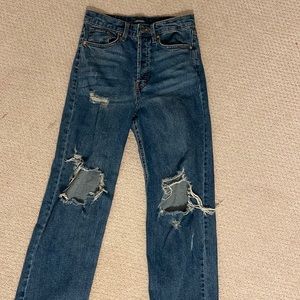 ripped dark wash wide leg jeans. size 4
